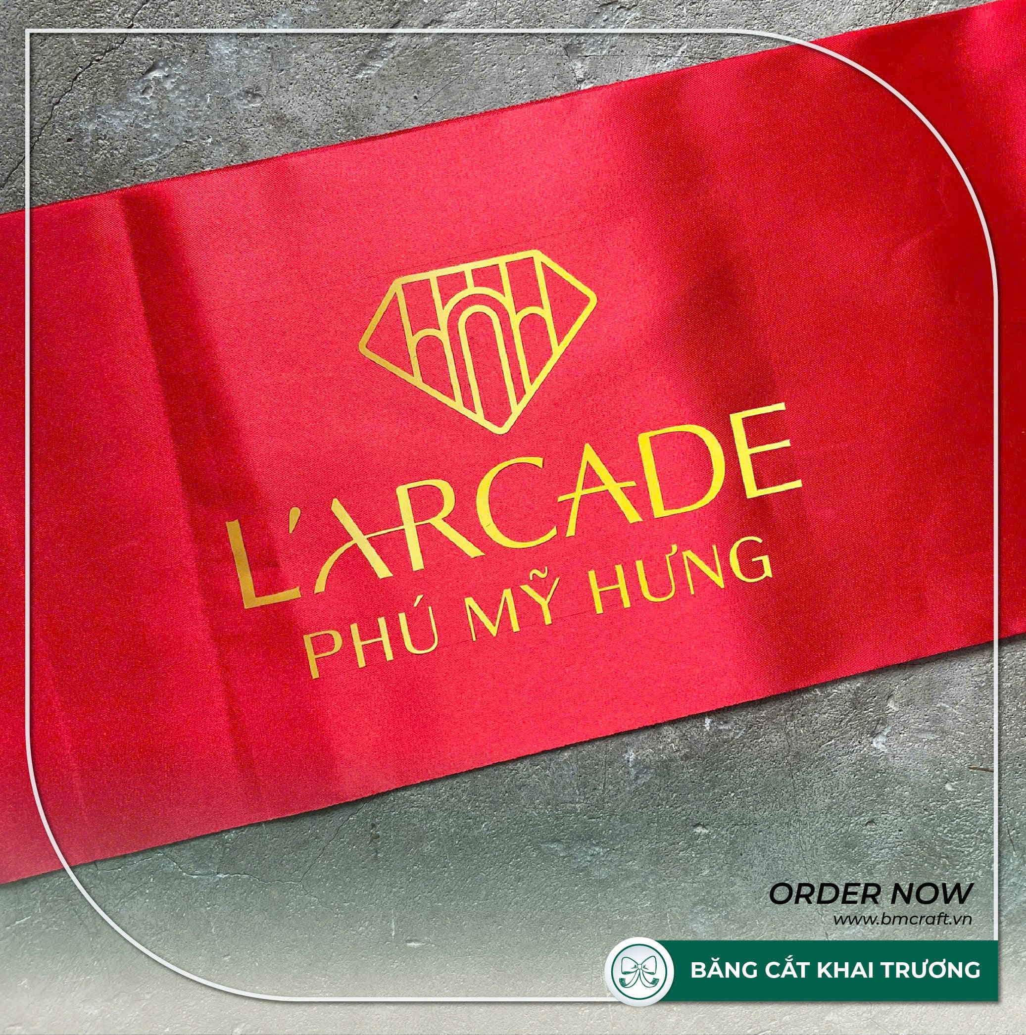 nơ giao nhà và băng cắt khai trương Phú Mỹ Hưng L’Arcade